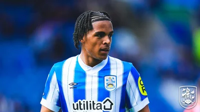 Swansea City agree N1.8 billion deal to sign Huddersfield's Super Eagles-eligible midfielder